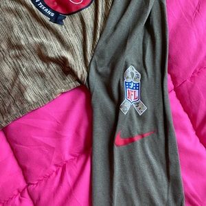 An Army green Nike Texans long sleeve womens shirt. Barley worn basically new!!!